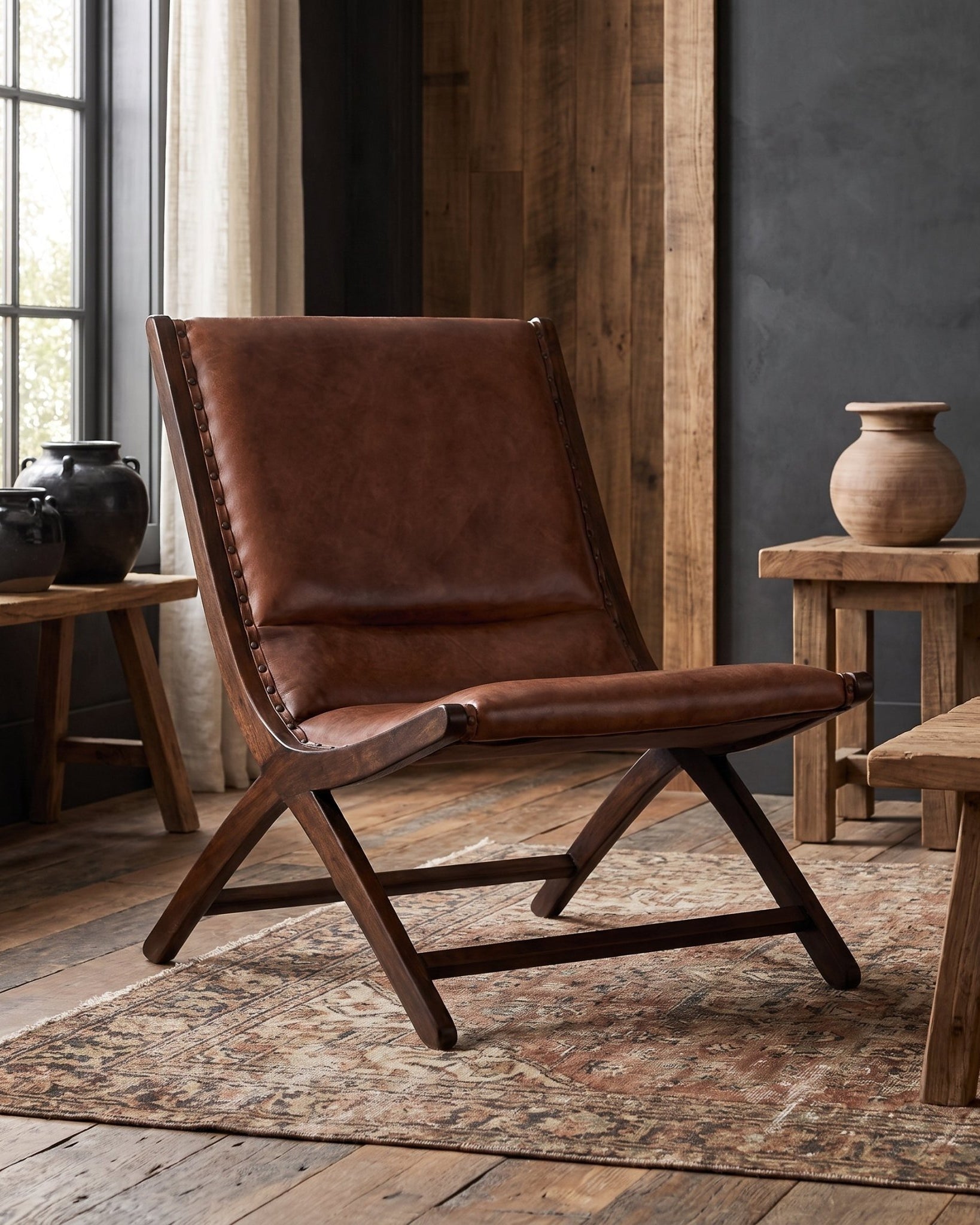 living room modern mountain chair Hello Norden - Borje Accent Chair, shown in a rustic modern room, close-up