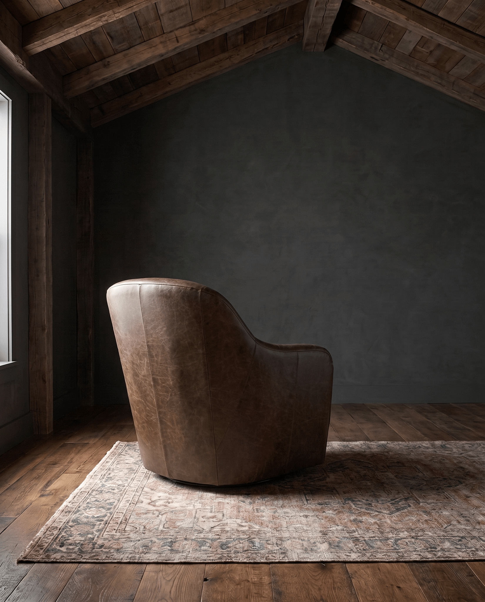living room custom furniture modern mountain leather chair Hello Norden - Signe Swivel Chair in St Croix Holm Sweet Holm leather, shown in a rustic modern room