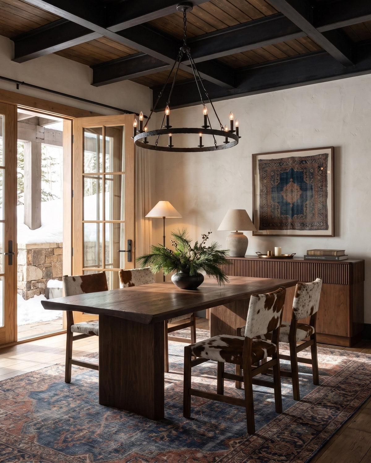 Thomas Dining Chairs Hello Norden around a wood dining table in a modern mountain dining room