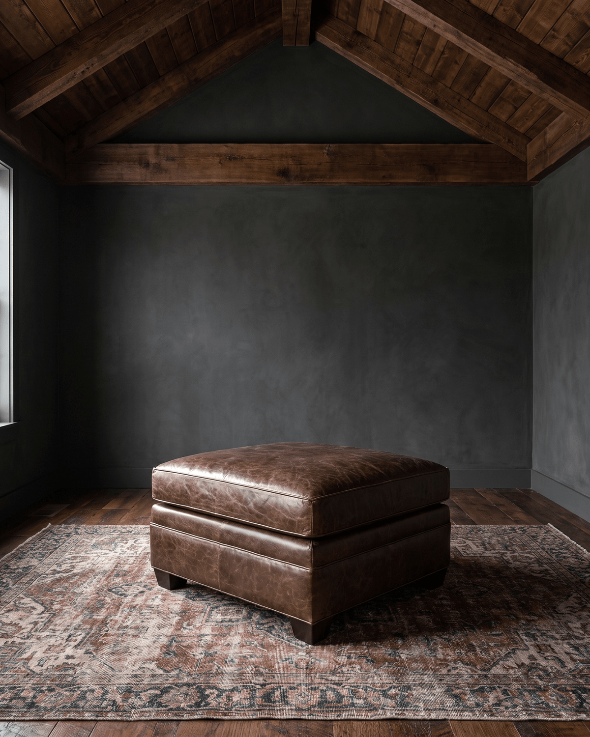 living room custom furniture modern mountain leather ottoman Hello Norden - Tyler Ottoman in St Croix Holm Sweet Holm leather, shown in a rustic modern room
