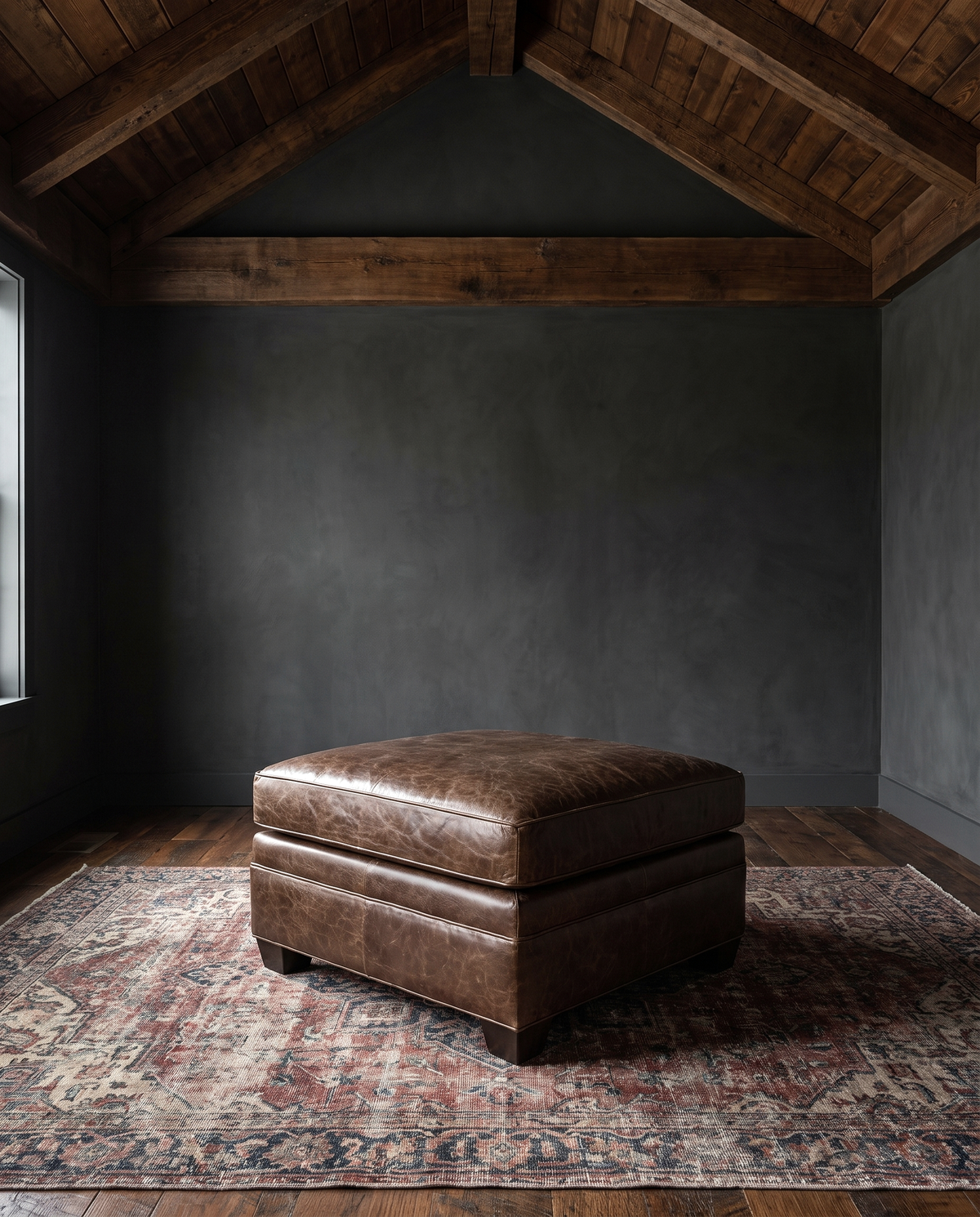 living room custom furniture modern mountain leather ottoman Hello Norden - Tyler Ottoman in St Croix Holm Sweet Holm leather, shown in a rustic modern room