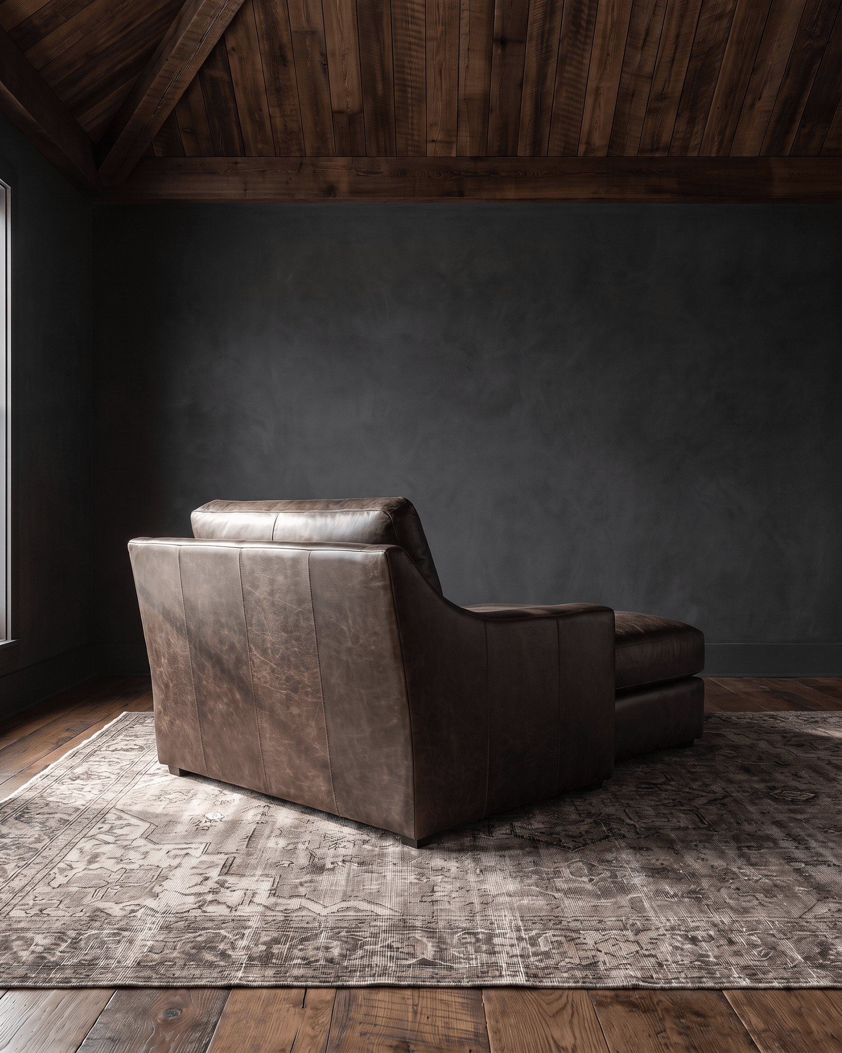 living room custom furniture modern mountain leather chaise Hello Norden - Wilhelm Chaise Lounge in St Croix Holm Sweet Holm leather, shown in a rustic modern room