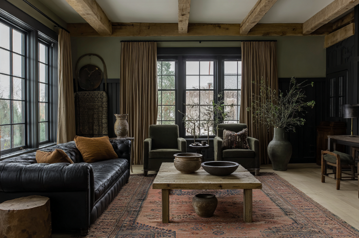 Vintage decor in a cozy living room with antique wood furniture, neutral tones, and layered textures – Hello Norden