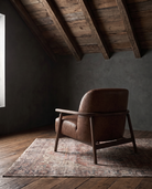 living room custom furniture modern mountain leather chair Hello Norden - Alrik Lounge Chair in St Croix Holm Sweet Holm leather, shown in a rustic modern room