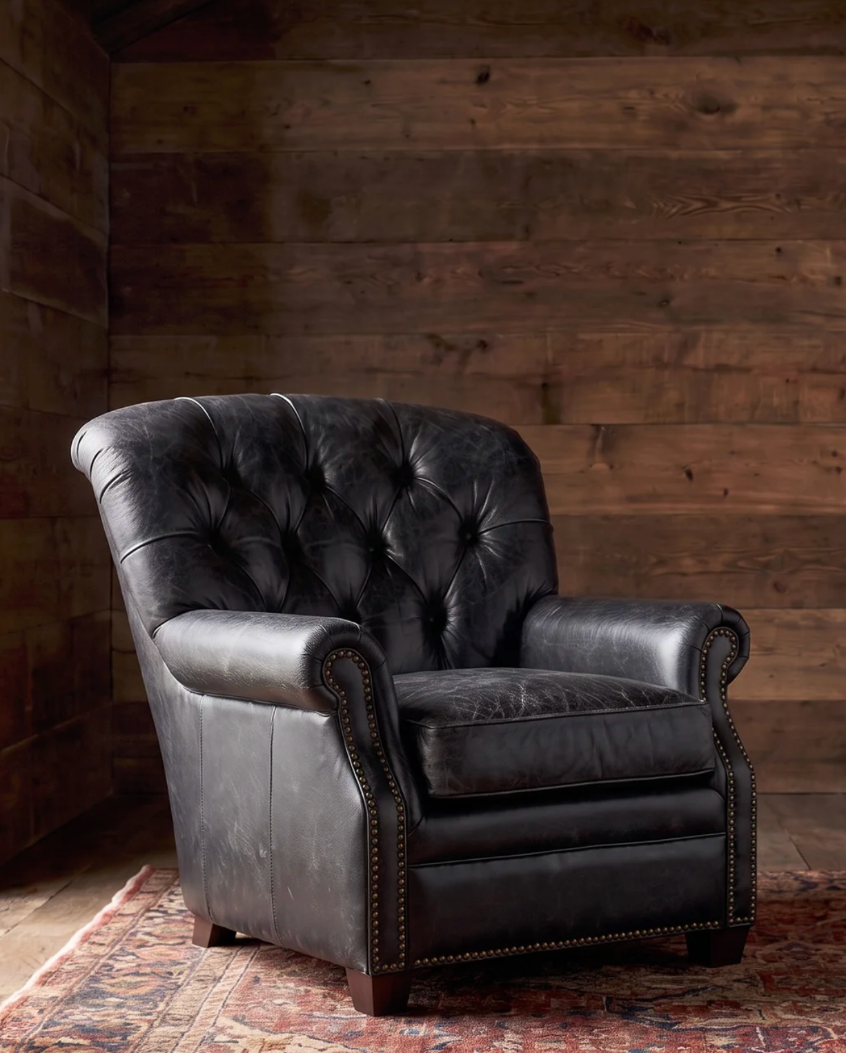 Hello Norden - Tyler Lounge Chair - with the matching Tyler Ottoman Custom Furniture Modern Mountain Living Room Black Leather Tufted Chesterfield wingback chair