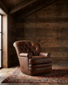 living room custom furniture modern mountain leather chair Hello Norden - Astrid Swivel Chair in St Croix Holm Sweet Holm leather, shown in a rustic modern room