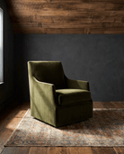 modern mountain Letty Swivel Lounge Chair Hello Norden, shown in a rustic modern room