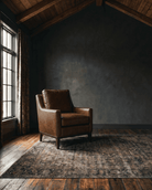 living room custom furniture modern mountain leather chair Hello Norden - Ruthie Chair in Yorkshire Brandy leather, shown in a rustic modern room