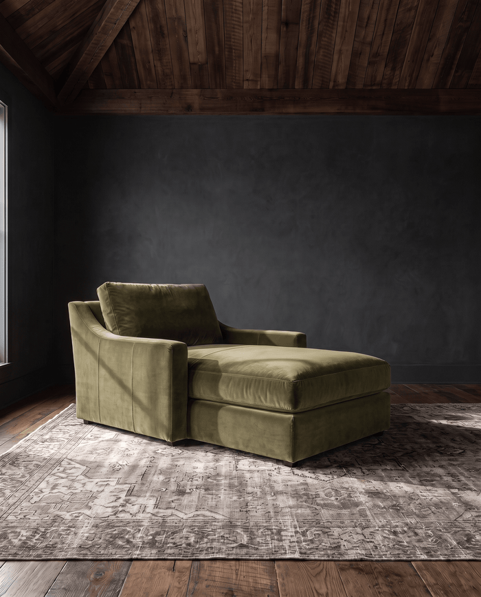 living room custom furniture modern mountain velvet chaise Hello Norden - Wilhelm Chaise Lounge in Banks Eco-Performance Velvet in Olive, shown in a rustic modern room