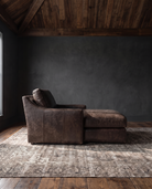living room custom furniture modern mountain leather chaise Hello Norden - Wilhelm Chaise Lounge in St Croix Holm Sweet Holm leather, shown in a rustic modern room
