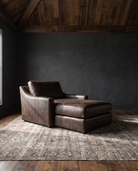 living room custom furniture modern mountain leather chaise Hello Norden - Wilhelm Chaise Lounge in St Croix Holm Sweet Holm leather, shown in a rustic modern room